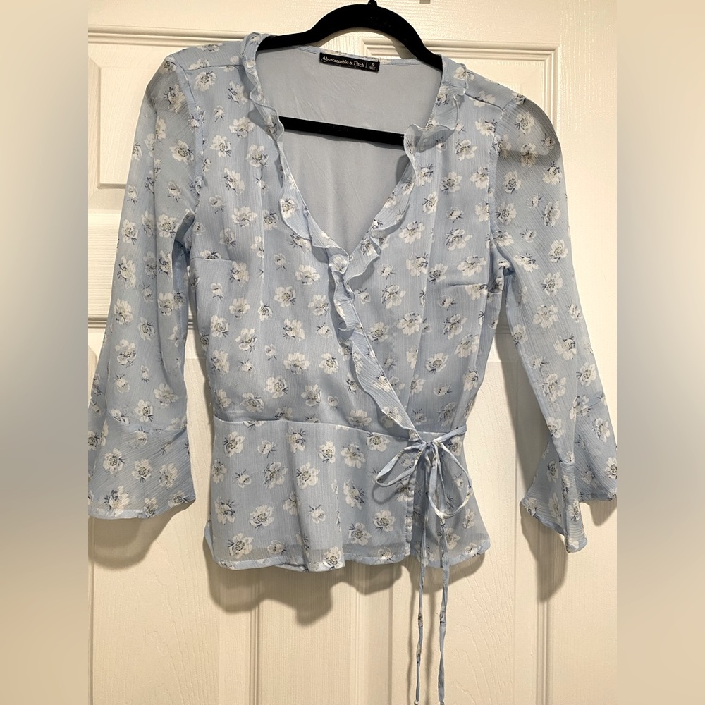 Peplum wrap blouse
